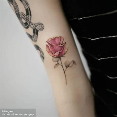 Pink Rose Tattoo On The Bicep Pink Rose Tattoos Small Rose Tattoo