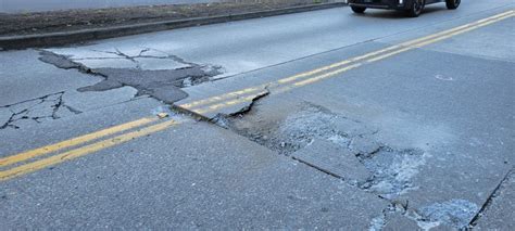 Crews Are Continuing Work To Repair Damage To Seattle Roads Caused By