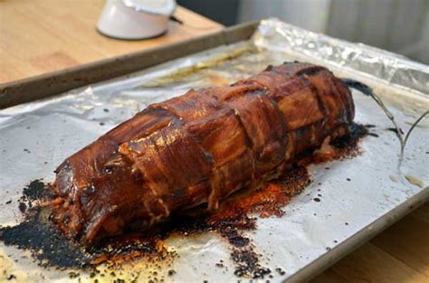 Take pork out of the oven; Bacon Wrapped Pork Tenderloin with Balsamic Glaze - SavoryReviews
