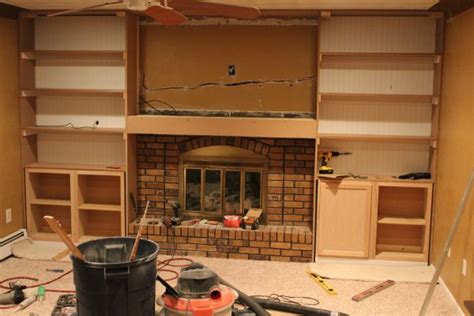 I nailed the two sides in place and then added the top piece. Remodelaholic | Fireplace Remodel With Built-in Bookshelves