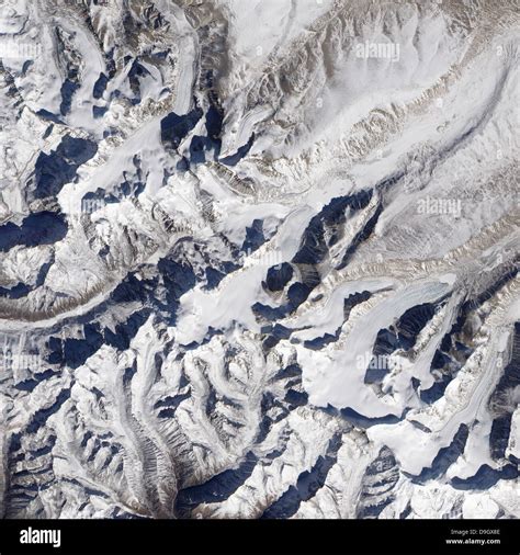 Satellite View Of A Himalayan Glacier Surrounded By Mountains Stock
