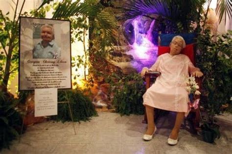 Rite Of The Sitting Dead Funeral Poses Mimic Life Funeral Funeral