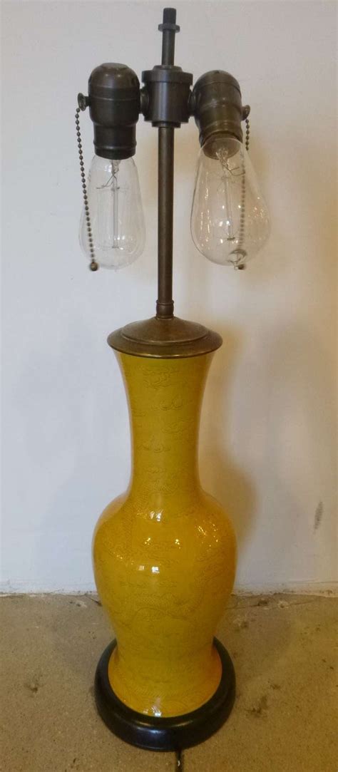 Antique Chinese Imperial Yellow Table Lamp For Sale at 1stdibs 14½ height x 13 wide custom pagoda shade, original 1920s frame & 1920s chinese patterns inserts, new pleated silk…