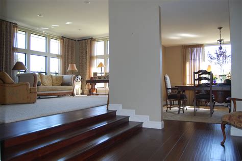 Large Remodeled Living Room With Carpet And Wood Stepsflooring And