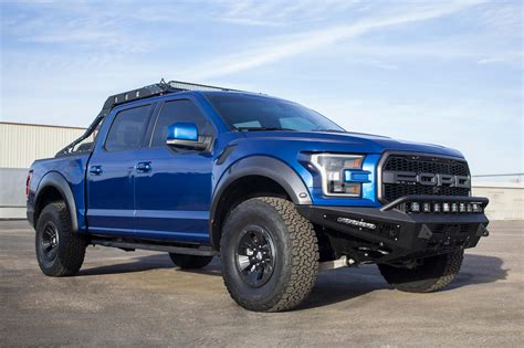 But he wasted no time modding it! 2018 Ford Raptor Lightning Blue | Camionetas, Furgoneta, Casa rodante