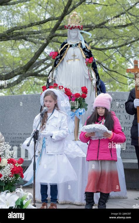 An 8 Year Old Girl Leads A Mothers Day May Crowning Service Of Devout Roman Catholics In A