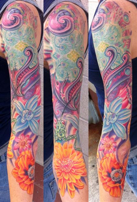 Flower And Bio Mech Sleeve Tattoo By Phil Robertson Tattoos