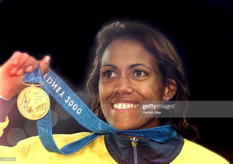 Cathy Freeman Of Australia Celebrates With Her Gold Medal After News Photo Getty Images