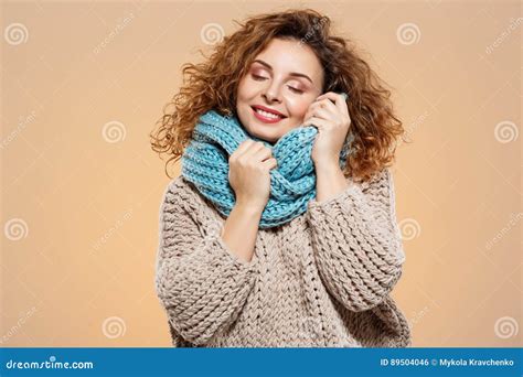 Close Up Portrait Of Cheerful Dreamy Smiling Beautiful Brunette Curly Girl In Knitted Sweater