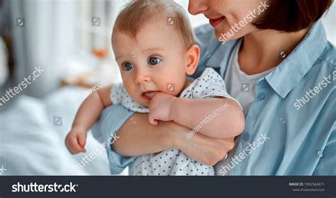 Loving Mom Carying Her Newborn Baby Stock Photo 1992564671 Shutterstock