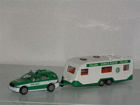 It origins from many different 1. Siku 2311 Mercedes ML320 met caravan politie | Diecast ...