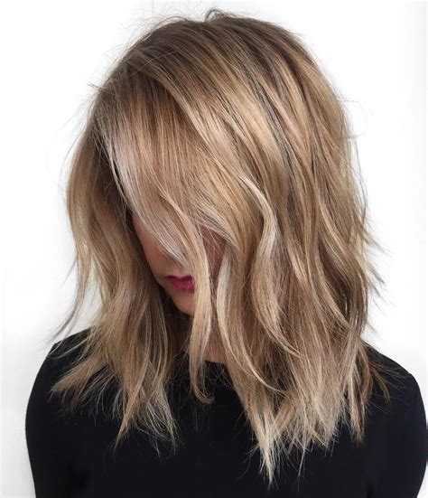 It draws attention to the person, brightens up any hairstyle, and makes the person have more fun (true story.) but there are so many. 40 Styles with Medium Blonde Hair for Major Inspiration