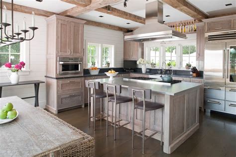 Such colors are a perfect reflection of the shades of ocean water. Light Oak Kitchen Cabinets Kitchen Beach with Bar Stools Beachy Beams | Coastal kitchen design ...