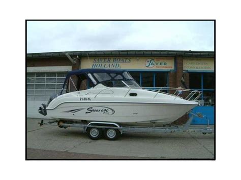 In the comfortable cabin 4. Saver 690 Cabin Sport in Liguria | Imbarcazioni cabinate ...