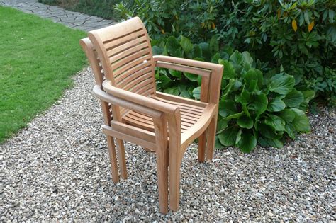 Teak arm chairs • your teak arm chair source. Two Teak Stacking Garden Chairs | Garden Furniture ...