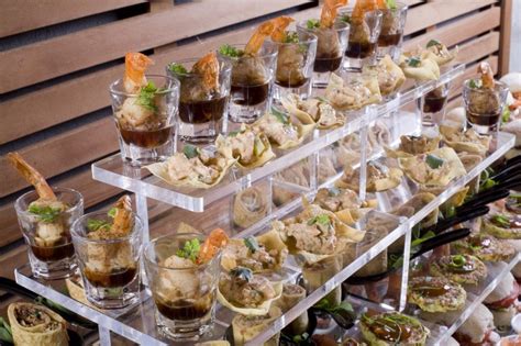 Others, like one bride's paper cones of fries and another's packets of popcorn, turned those classics into the ultimate snacks—which made them compact enough to tote around during the cocktail hour. food station trends in catering | Embrace Buffet Foods for ...
