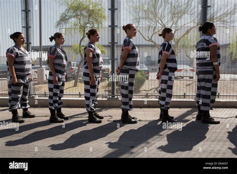 Inmates Of The Female Chain Gang Line Up Ready To Enter Estrella Stock