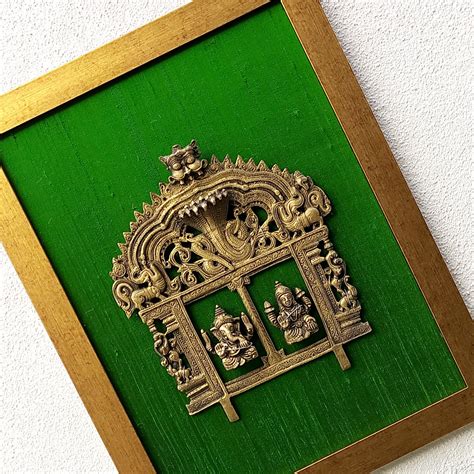 Magnificent Framed Brass Temple Prabhavali With Lord Ganesha And Lakshmi