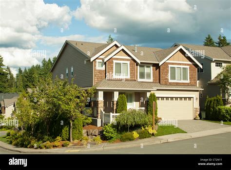 New Beautiful Suburban House With Blue Sky And Clouds Stock Photo Alamy