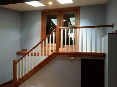 Newly Remodeled Stairs And Oak Railing Landmark Contractors