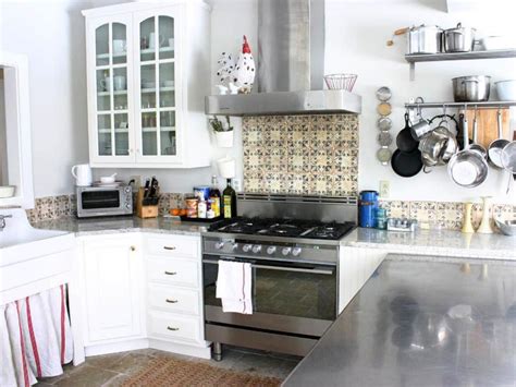 Tiles seem to change color from different angles in the kitchen, and bring a lightness to the dark lower cabinets. Rustic Kitchen Backsplash | Eclectic kitchen, Rustic ...