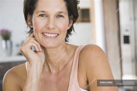 Portrait Of Smiling Mature Woman With Short Hair — Human Face Emotion