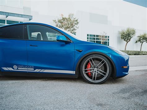 Deep Blue Metallic Tesla Model Y Up 04 Wheels Unplugged Performance