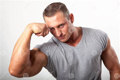 Muscular Man Flexing His Biceps On White Stock Photo Image Of Adult