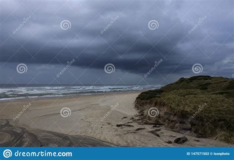 Dark Storm Clouds Over Ocean Beach Tasmania Stock Photo Image Of