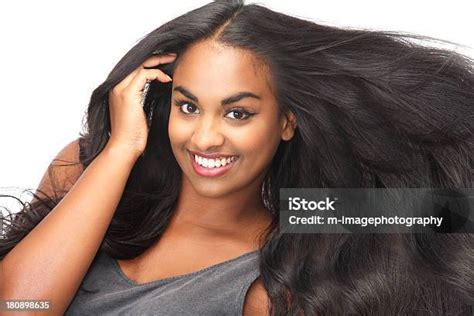 Smiling Woman With Long Flowing Hair Stock Photo Download Image Now