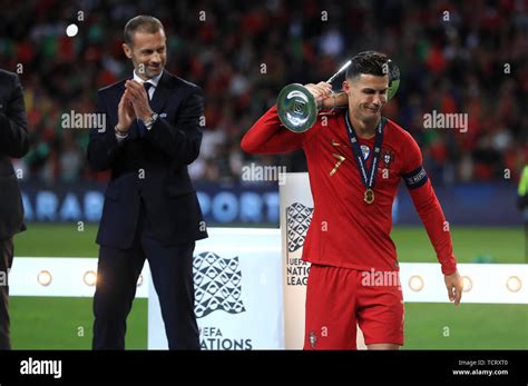 Portugals Cristiano Ronaldo Lifts Trophy Hi Res Stock Photography And