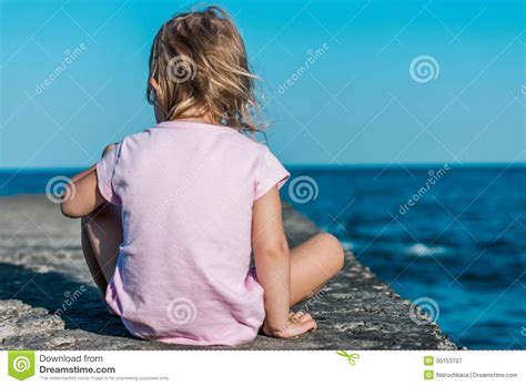 Child Quietly Contemplating The Sea Stock Image - Image of coastline ...
