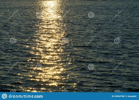 The Setting Sun Is Reflected In The Water Stock Image Image Of