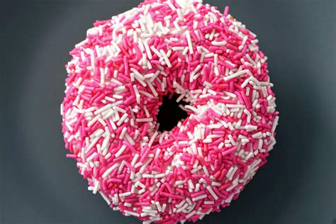 Doughnut With White And Pink Sprinkles · Free Stock Photo