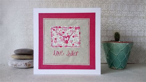 A short and sweet letter can also be very romantic for the person concerned if it is written with genuineness. 'Love Letter' Handmade Embroidery Greetings Card only £6.00
