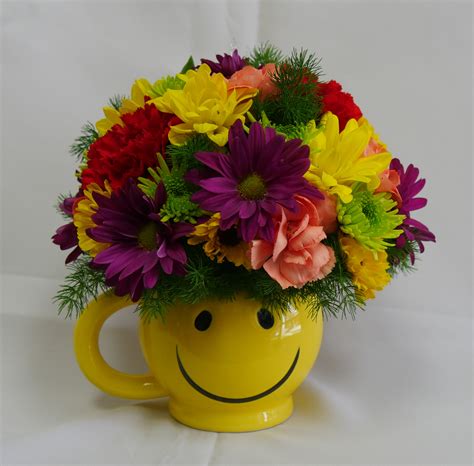Smiley Mug With Flowers United Regional Health Care System