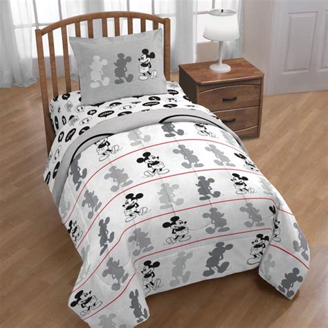 Featuring adorable graphics of mickey and friends, this sturdy bed is outfitted with two side rails, so you can rest easy knowing your boy will also. Mickey Mouse Jersey Classic Twin/Full Reversible Comforter ...