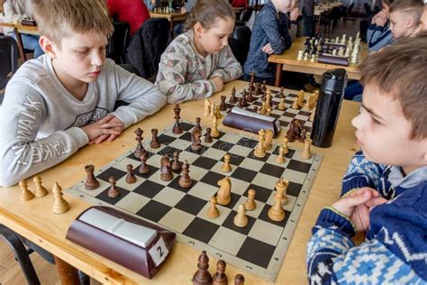 Kids Play Chess During Chess Competition In Chess Club Education