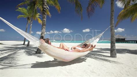 Couple Relaxing In Hammock On Tropical Beach Stock Footage Youtube