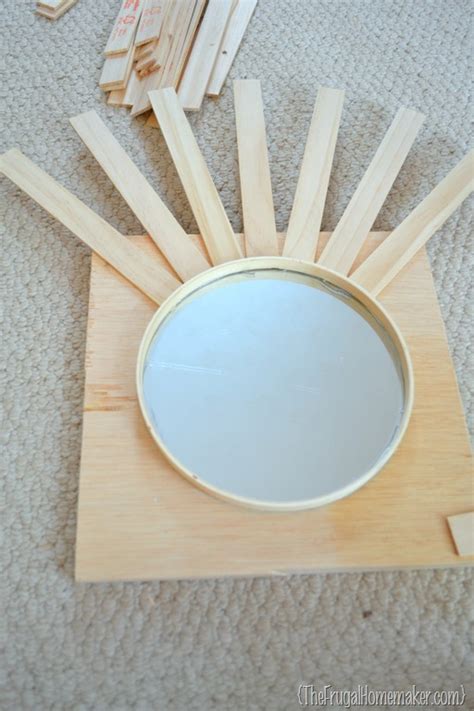 For kids' rooms, decorate with cool illusion stickers that make it look like 3d superheroes or cartoon characters are busting through the wall, or add a 3d window sticker to a drab wall that makes it look like you have a seaside view. DIY Sunburst Mirror {$4 wall art}