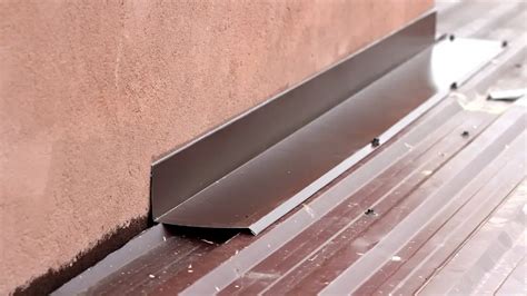 how to flash a metal roof to a wall