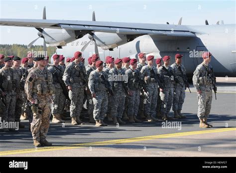 Riga Latvia Us And Latvian Soldiers Stand In Formation During A