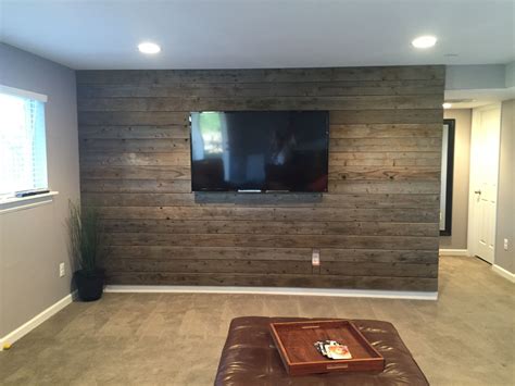 How to restore old stone basement walls | hunker. Basement wall covered with old deck wood | Wood deck ...