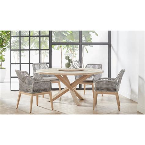 We love how architecture as evolved with large great rooms and dining tables as the soft division of the two spaces. Brandy Coastal Beach Round Outdoor Teak Dining Table ...