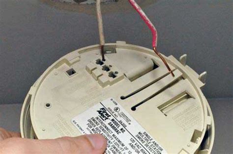 I tried removing the batteries. Why Smoke Detectors Sound False Alarms - One Project Closer