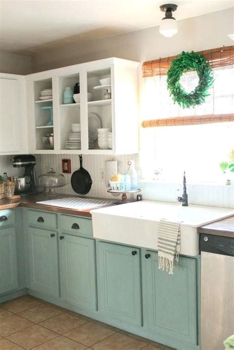 A white quartz countertop with a callacatta 3x6 tile backsplash (shown below) would look wonderful with it. Image result for wonderful duck egg blue kitchen cabinets ...