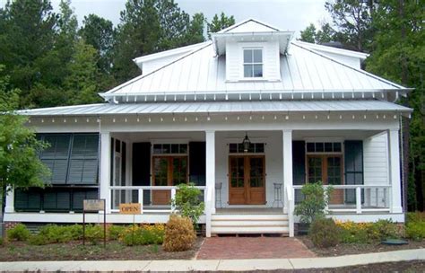 Low Country Cottage House Plans Southern Living in 2020 ... This two bedroom southern cottage house plan has a brick exterior with a side porch that opens to a pergola giving you a great place to enjoy the fresh air.the front door welcomes you to the living room which is open to the dining room beyond.