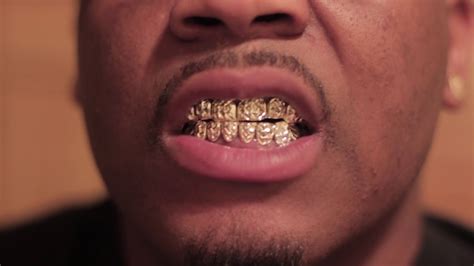 | new custom 14k gold plated hip hop teeth grillz caps top & bottom grill fang set. Rithka: Silver Diamond Cut Grillz In Mouth