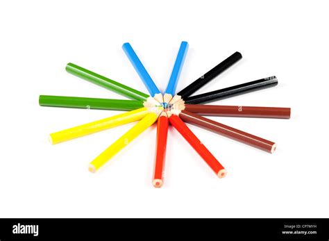 Many Colored Pencils Arranged In Circle Over White Background Stock