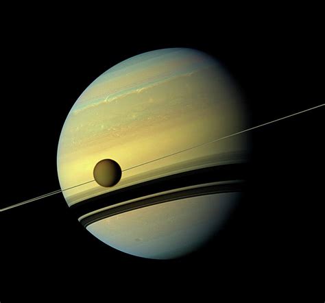 Titan And Saturn Photograph By Nasajpl Caltechspace Science Institute